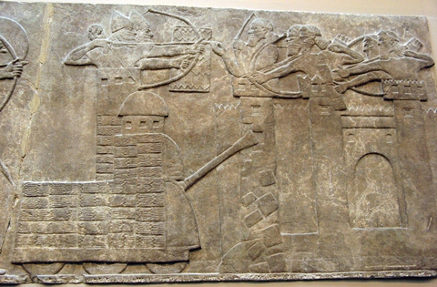 Assyrian attack on a town with a battering ram (9th century BC)