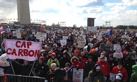 A protest near the Washington Monument in early 2013 to protest the Keystone XL pipeline and support action on climate change (photo by Jmcdaid).
